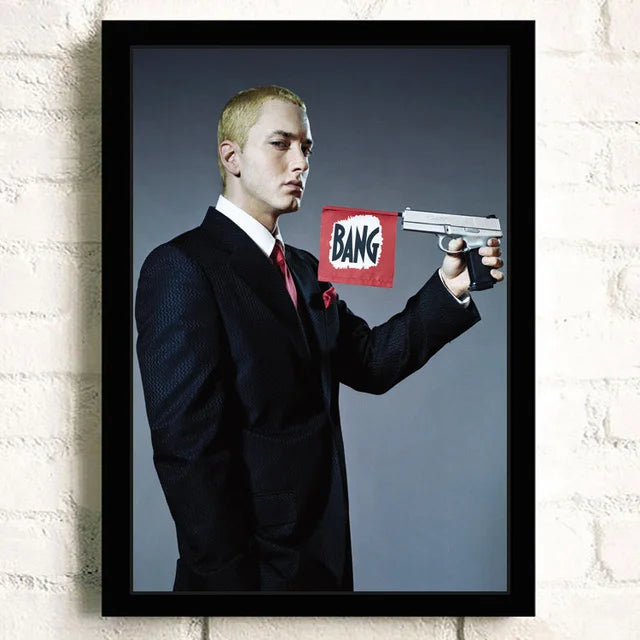 Black framed poster of man in dark suit holding silver handgun with red bang sign for color change wall art decor