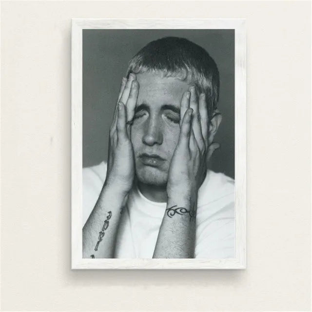 Black and white framed portrait of rapper with hands covering face and visible forearm tattoos in color change print poster