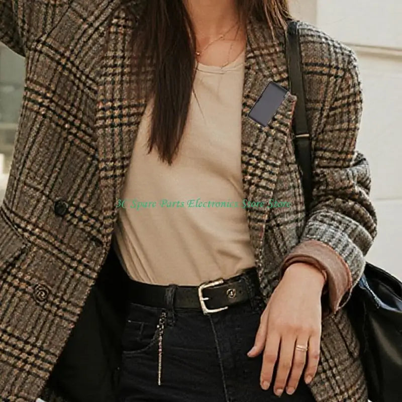 Brown and beige plaid wool blazer with double-breasted front shown alongside intelligent wireless microphones with touchscreens control for computer recording