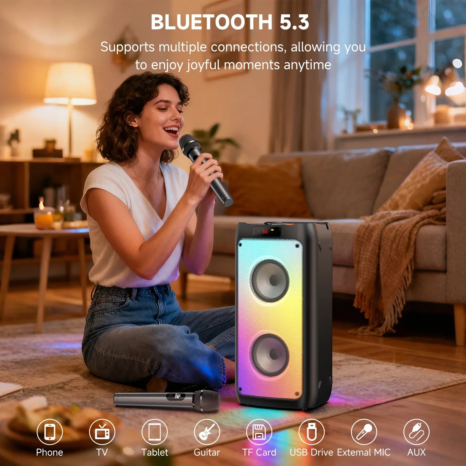 Black portable bluetooth speaker with dual circular drivers and vibrant disco lights for karaoke and party use