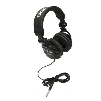 Black tascam th-02 closed back studio headphones with padded earcups and coiled cable for professional recording monitor headset