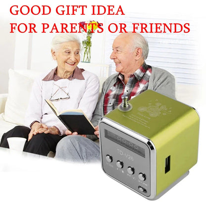 A lime green and silver td-v26 mini portable bluetooth speaker with aluminum alloy body, digital clock, tf card, and usb port