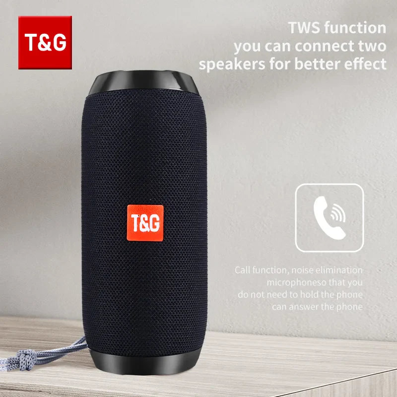 Black t&g portable bluetooth speaker with textured fabric exterior and red logo patch for outdoor waterproof use