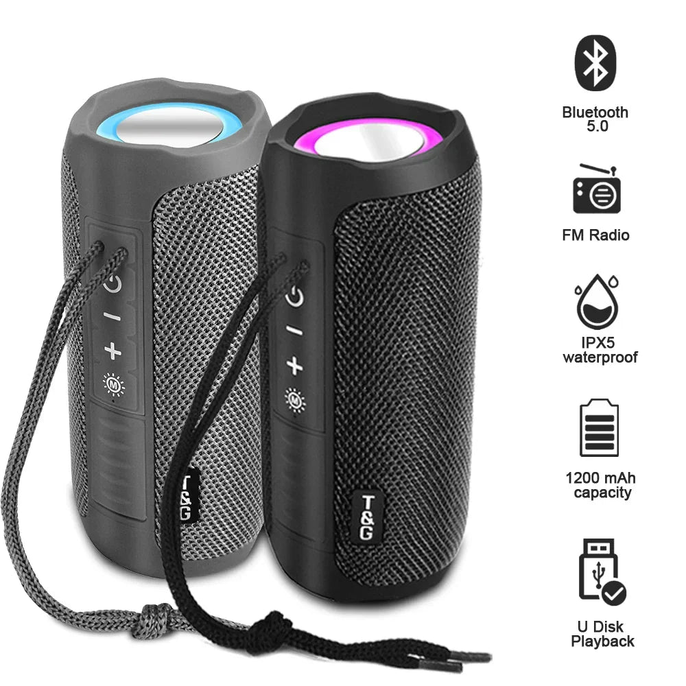 Two cylindrical t&g tg227 lamp outdoor portable wireless compatible speakers in gray and black with textured fabric for radio music party