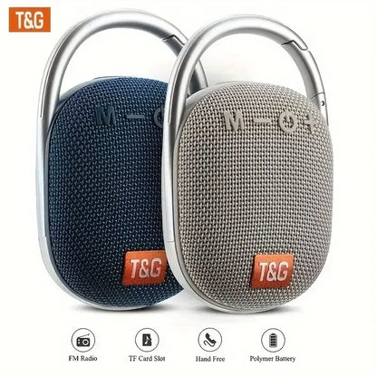 Two tg321 outdoor portable waterproof wireless bluetooth fabric speakers with silver carabiner clips and orange t&g branding
