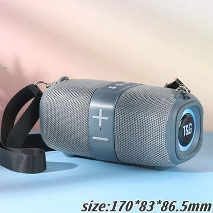 Gray mesh-textured tg667 outdoor protable wireless bluetooth speaker with black strap and silver control panel dual speaker bluetooth 5.3