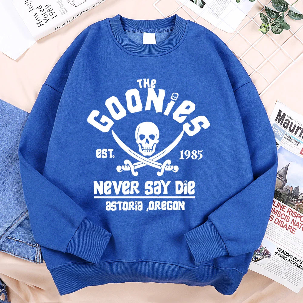 Royal blue loose fleece sweatshirt with white the goonies graphic, skull emblem, and text, ideal for menswear fashion fitness