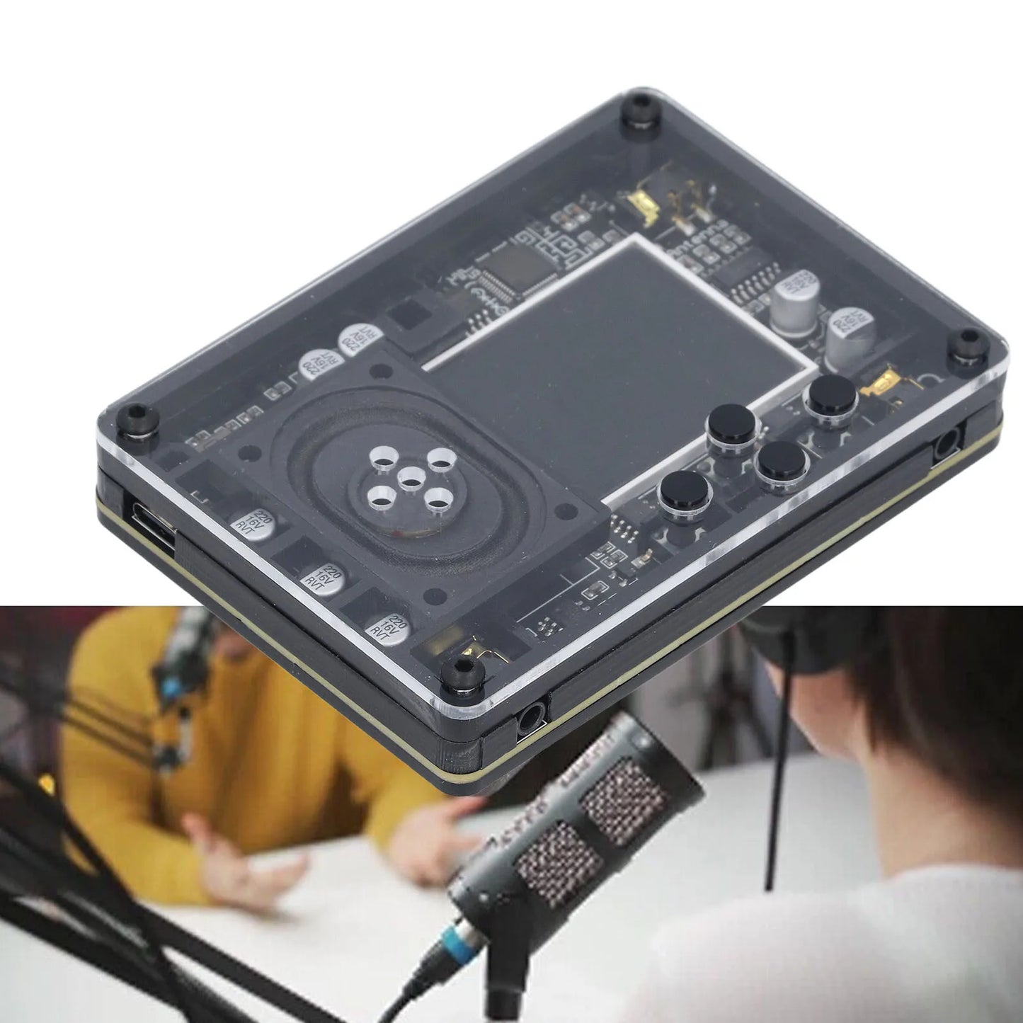 Clear acrylic case housing a black circuit board with knobs and screen in a theremin kit electronic musical instrument gift