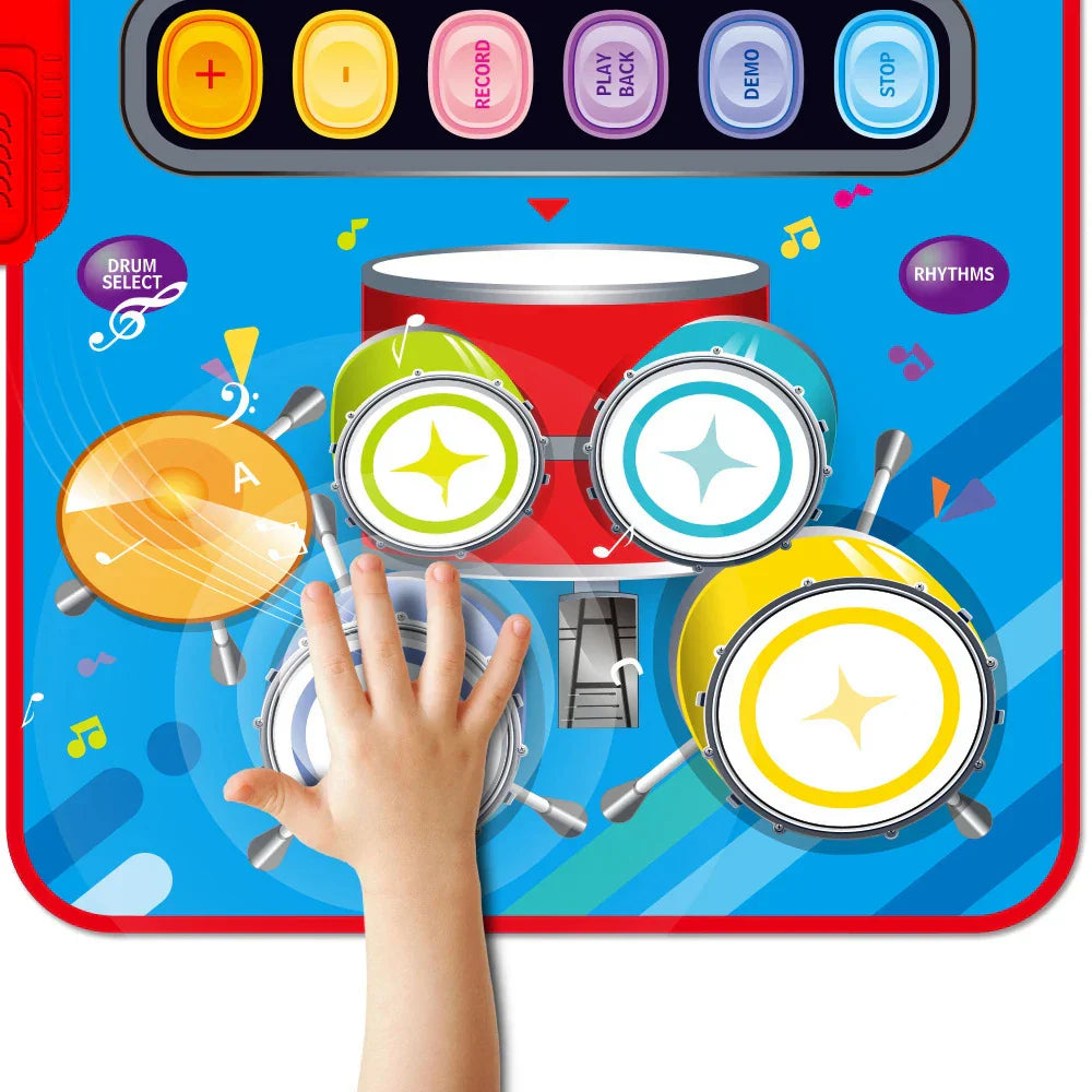 A child plays a colorful toddler musical piano floor keyboard drum mat with vibrant drums and instruments sounds toy