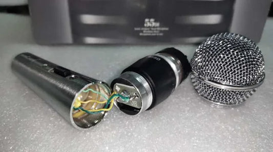 Silver mesh grille dynamic 565sd microphone with black body and visible wiring professional karaoke handheld wired microphone