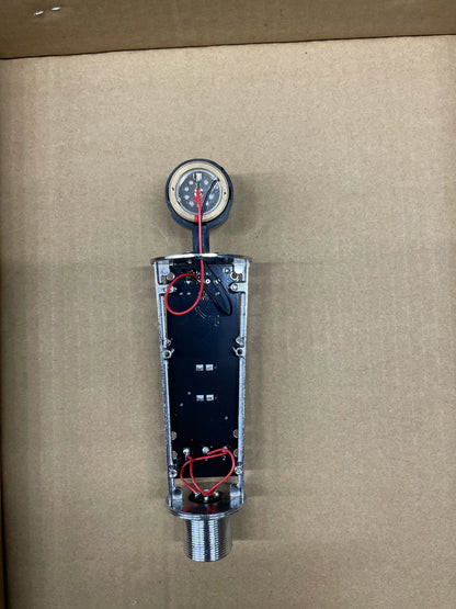 Silver metallic pressure gauge with threaded base on black circuit board for studio metal u87 professional cardioid studio use