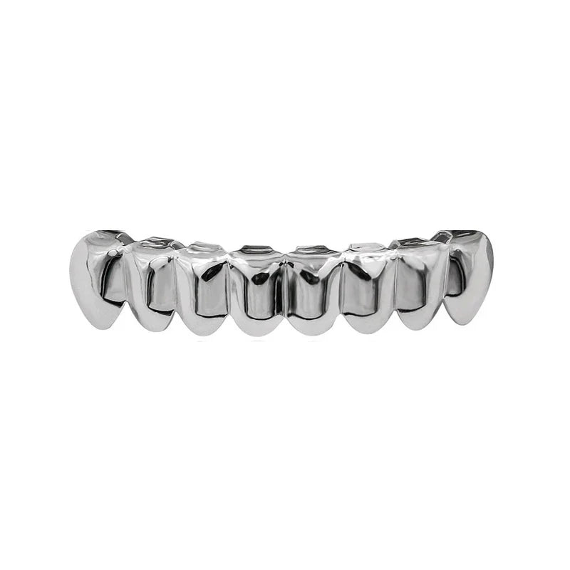Shiny silver metallic grillz set gold with bold jagged design for body jewelry punk and cosplay party tooth use