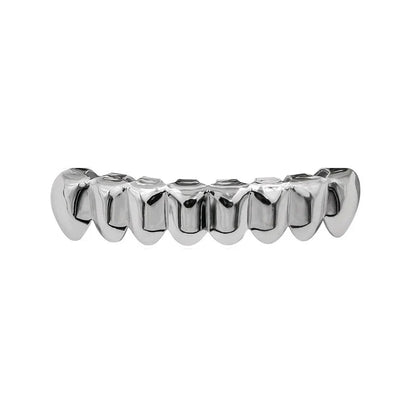 Shiny silver metallic grillz set gold with bold jagged design for body jewelry punk and cosplay party tooth use