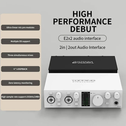 White and black topping e2x2 professional audio interface with minimalist design includes knobs ports and led display for live streaming recording mixing