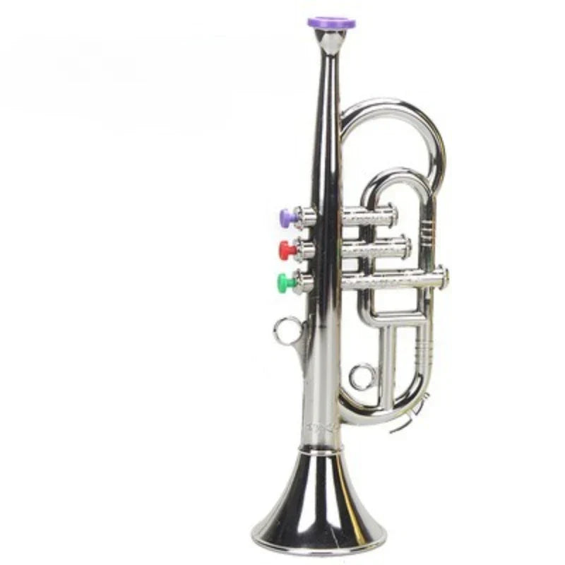 Shiny silver toy trumpet with colorful purple red and green valve caps as part of kids wind coded keys teaching set