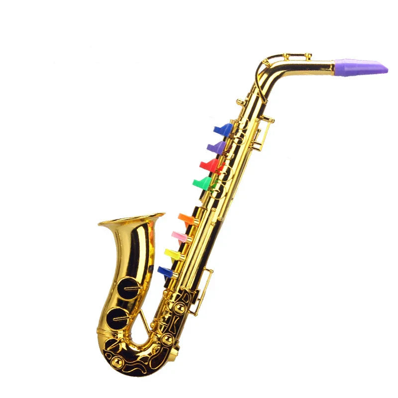 Golden toy clarinet with colorful plastic coded keys and purple mouthpiece for kids wind and brass instrument teaching