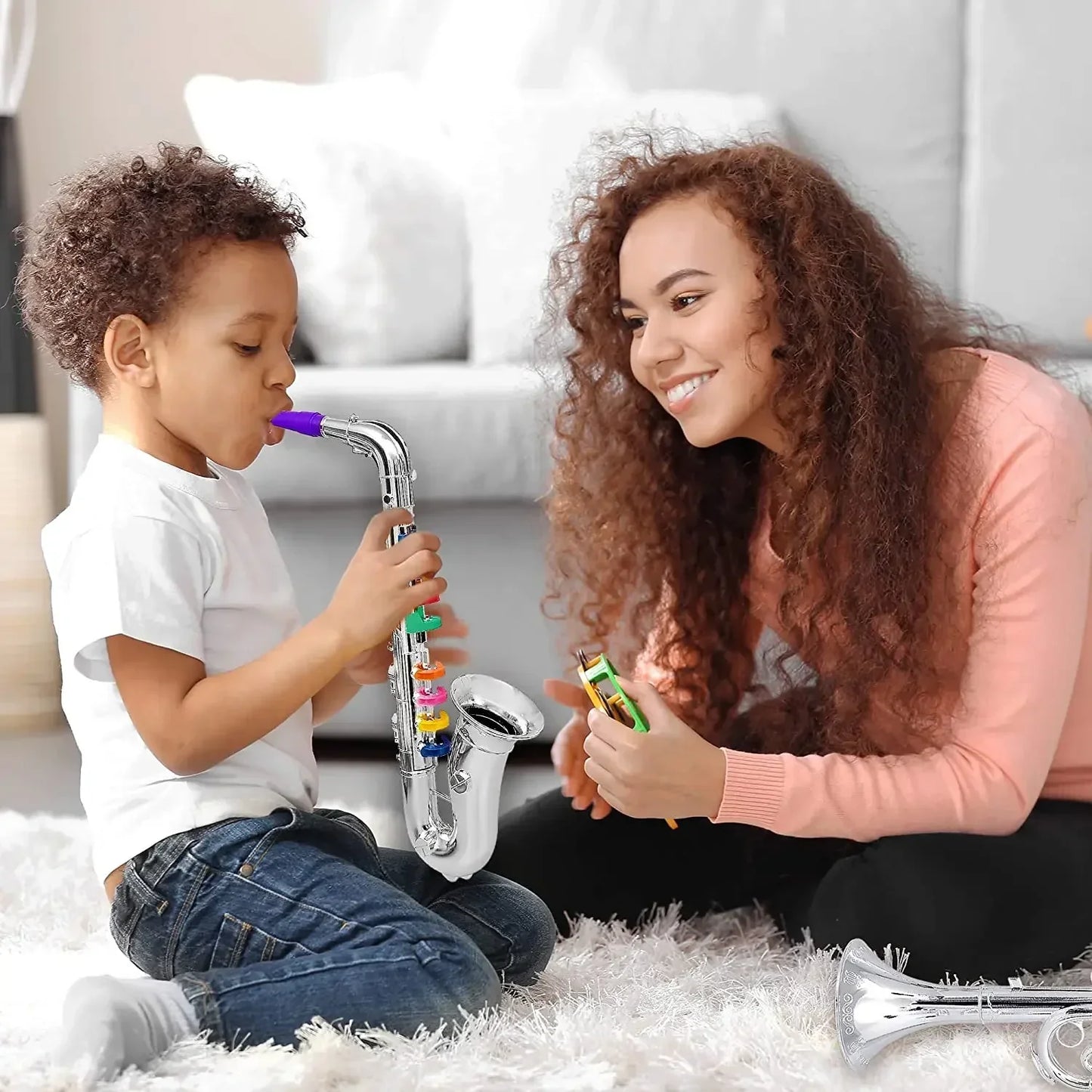 Toy clarinet for kids with shiny silver body purple mouthpiece and 8 rainbow coded keys teaching songs for toddlers