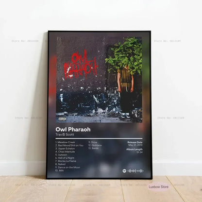 Black-framed canvas poster of travis scott owl pharaoh album cover with red graffiti and green foliage for home decor
