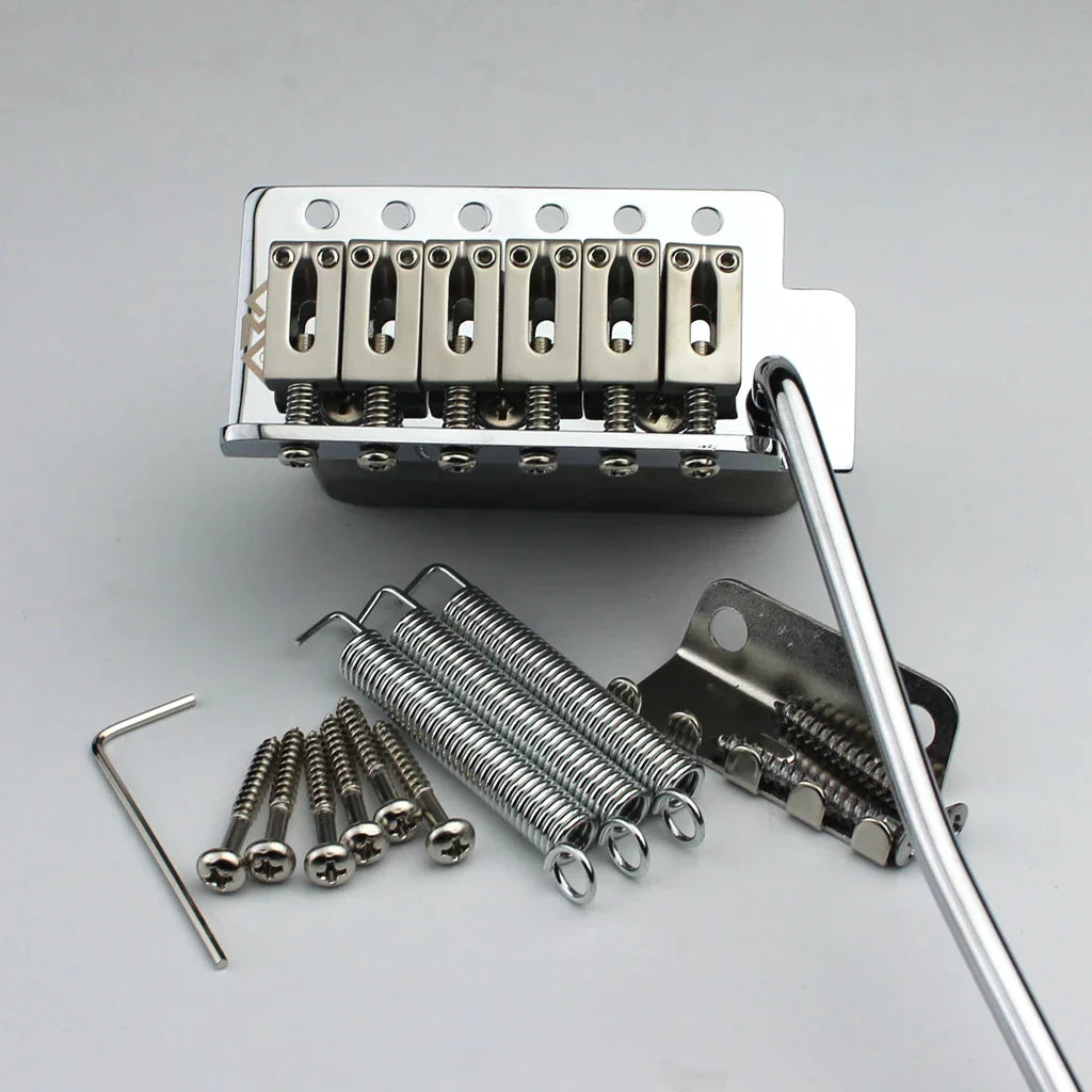 Chrome silver tremolo bridge system with six-saddle base plate and matching springs for stratocaster st electric guitar