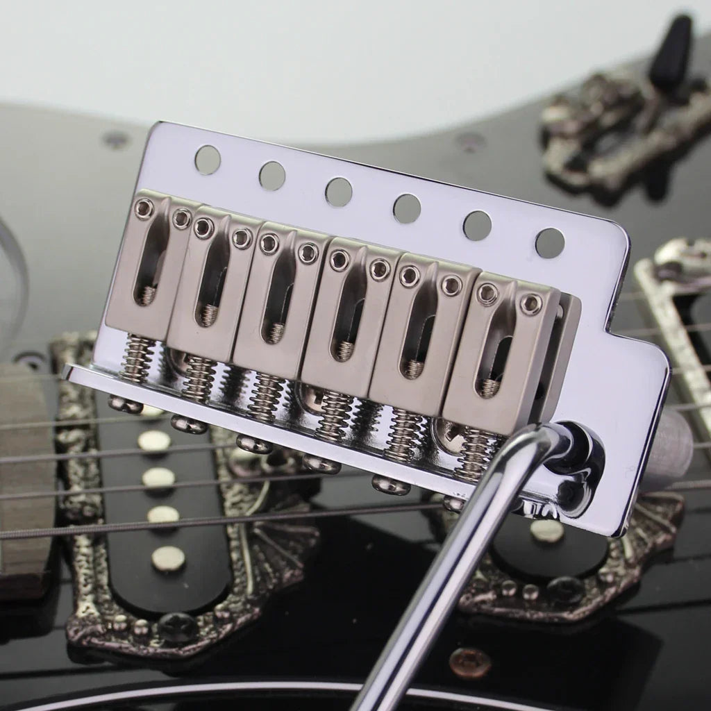 Shiny chrome tremolo bridge system for stratocaster st electric guitar with six saddles and visible springs