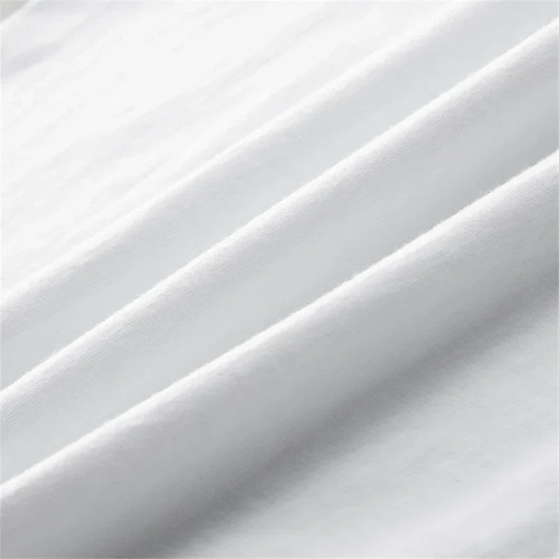 White soft textured cotton fabric with gentle folds in trend tv girl lovers rock song hip hop oversized t shirt design
