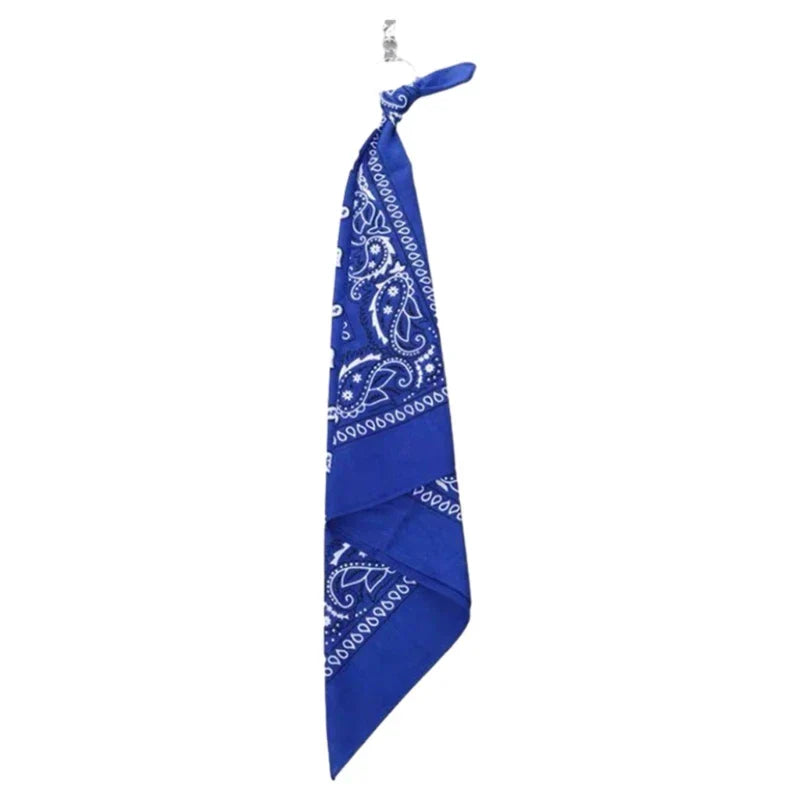 A vibrant royal blue paisley bandana tied at the top for trendy cashew print pants chain hip hop style accessories
