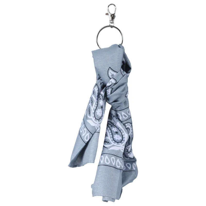 Light blue bandana with white paisley pattern attached to metal key ring for trendy cashew print hip hop style pants chain