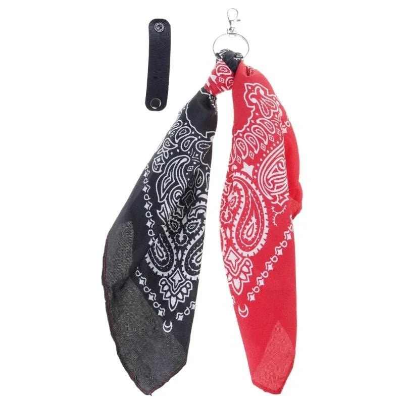 Red and black paisley bandana with white detailing attached to a key ring for a trendy cashew print hip hop style pants chain
