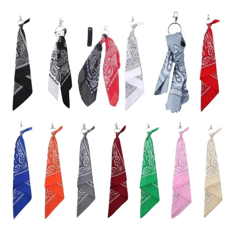 A collection of colorful paisley bandanas with metal rings as trendy cashew print pants chain hip hop style accessories