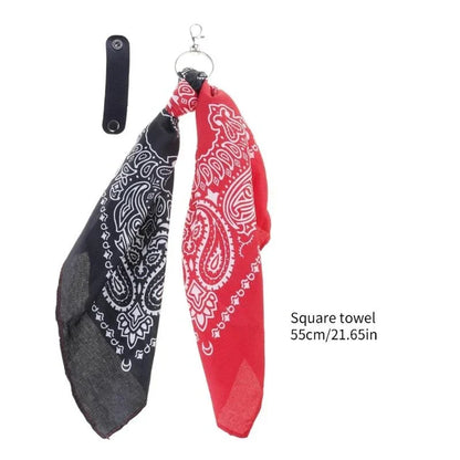 Red and black paisley patterned square bandana with silver key ring attachment for trendy cashew print pants chain hip hop style