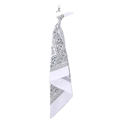 White bandana with black paisley pattern and silver clip as a trendy cashew print pants chain hip hop style accessory