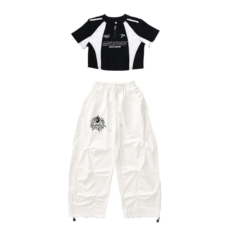 Black and white cropped top with bold graphic print and contrasting shoulder panels for teenage child hiphop dance rapper clothes