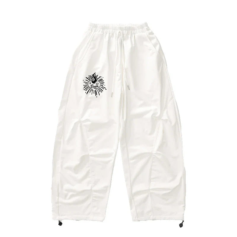 White drawstring pants with black graphic logo on left thigh for teenage child hiphop dance rapper clothes and hip hop costume