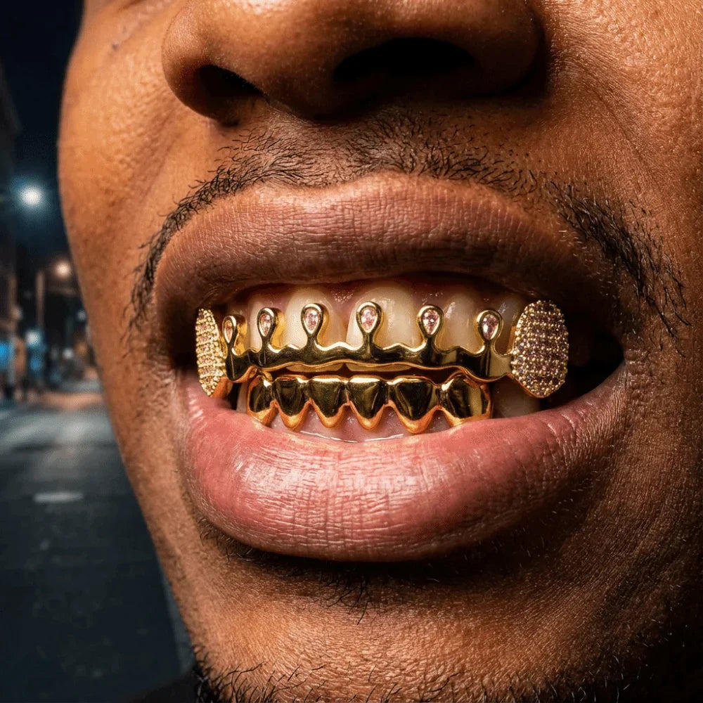 Gold-colored hiphop teeth grillz with diamond-encrusted rhinestone tooth caps and crown design for punk bling style