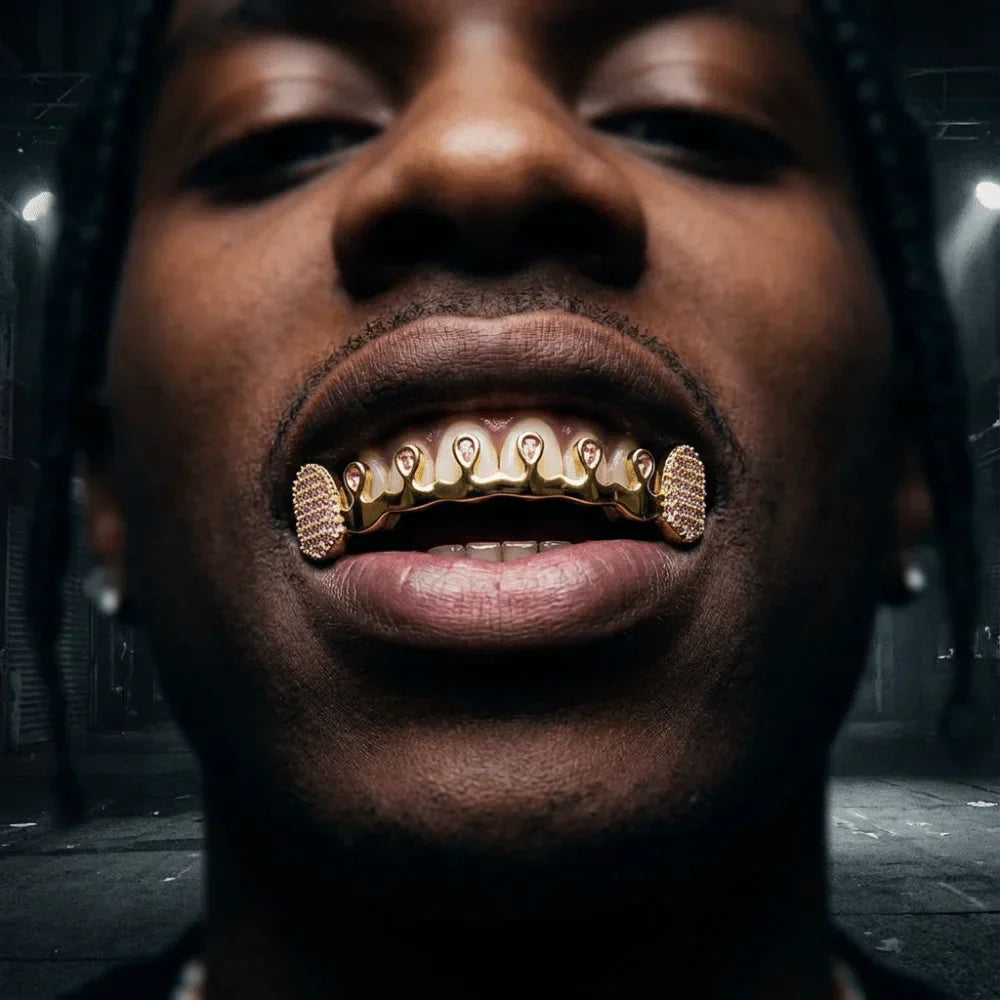 Gold-colored diamond-encrusted hiphop teeth grillz with shiny metallic finish rhinestone tooth caps for unisex use