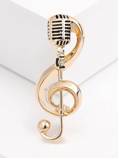 Gold-colored smooth notes brooches featuring a treble clef pin with black enamel detailing for gifts jewelry accessories