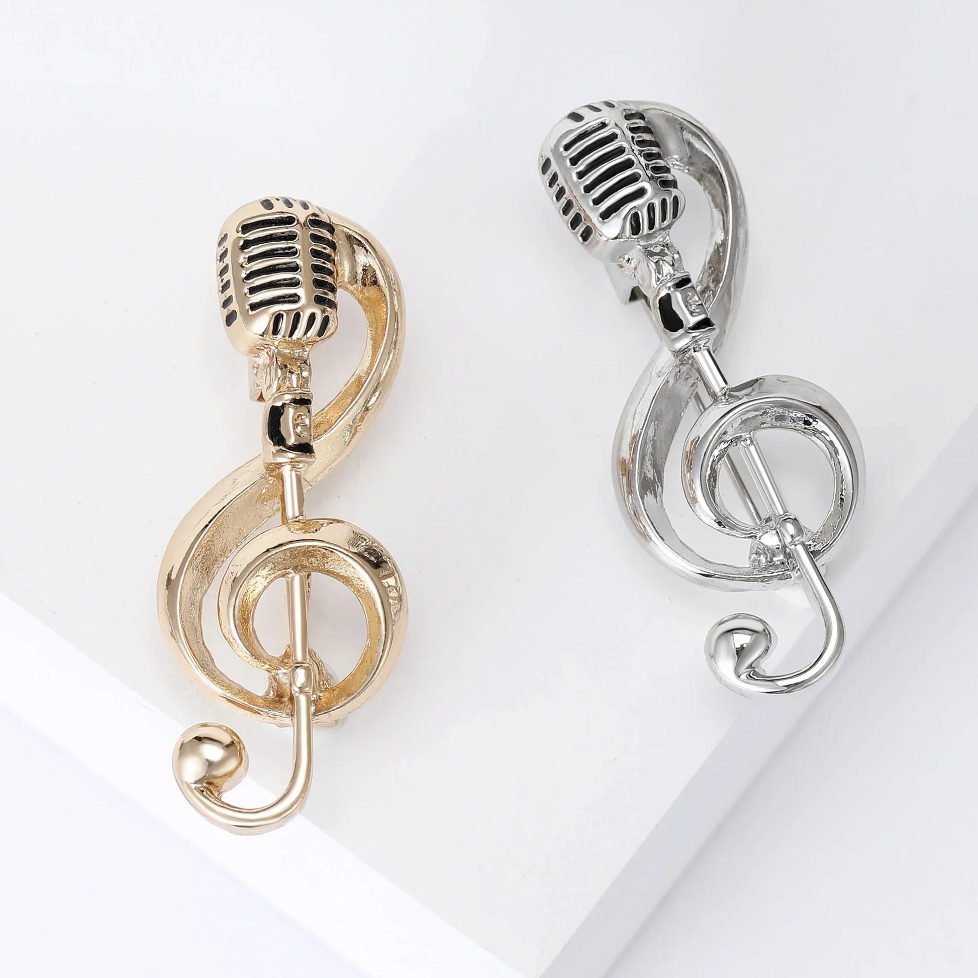 A pair of trendy smooth notes brooches featuring vintage-style gold and silver unisex music microphones gifts jewelry accessories