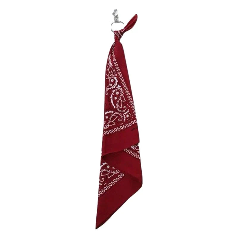 A crimson red square scarf pants featuring a white paisley cashew print and a metal ring for trousers chains hip use