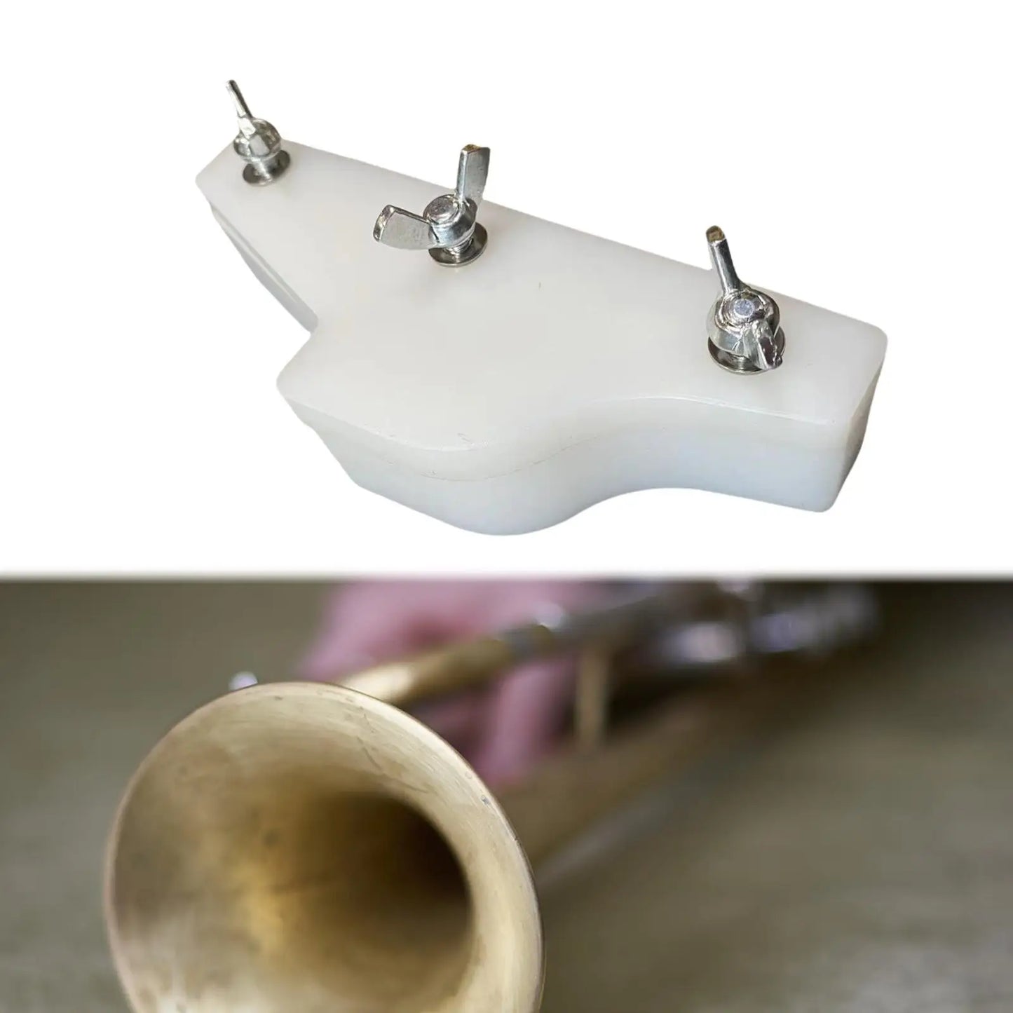 White plastic trumpet mute with three silver wing nuts metal repair tool for trumpet repair and winds instrument repair