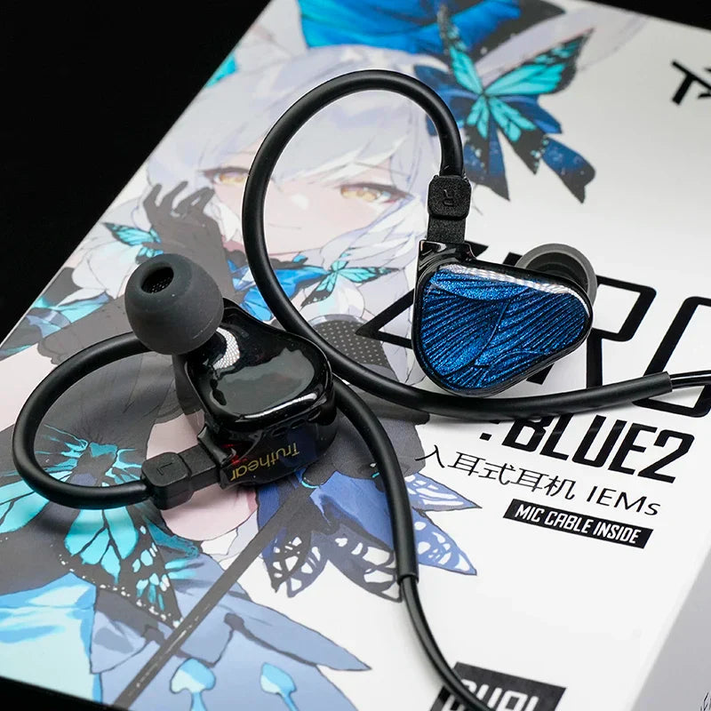 Blue iridescent butterfly patterned truthear x crinacle zero blue2 in-ear monitors with black housing and dynamic vocalism principle