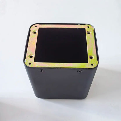 Black rectangular tube amplifier case with gold metallic frame, base transformer cover, and isolation shrouds visible