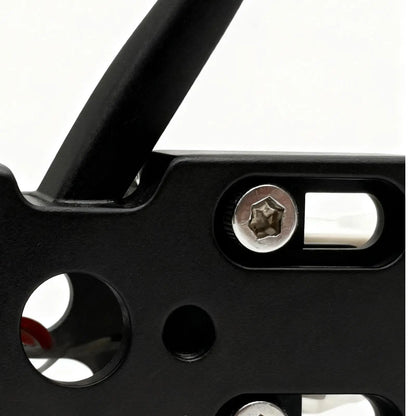 Black metal turntable cartridge easy-mount rig with silver hex screws and cutout holes for adjustable record playing and studio monitoring routine
