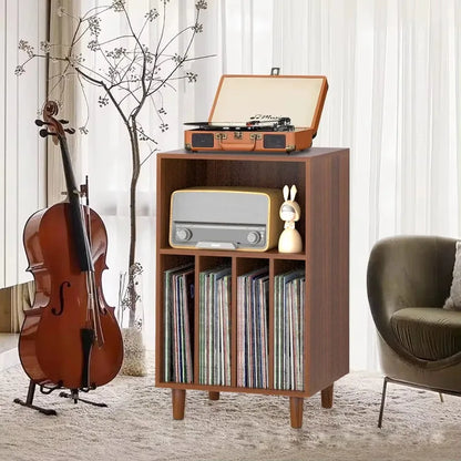 Brown wooden media console with open shelves, turntable stand, vintage radio, and orange suitcase turntable for music lover decor
