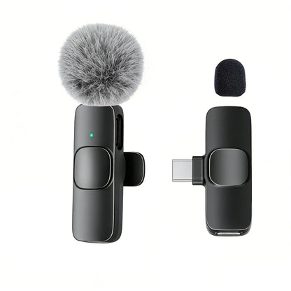 Black wireless lavalier microphone with fluffy gray windscreen and foam cover for smartphones computers and cameras plug and play