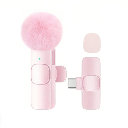 Pink wireless lavalier microphone transmitter with fluffy pom-pom and type-c connector for plug and play use