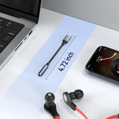 A sleek metallic silver usb-c to 3.5mm jack earphone adapter with black cable for pro max samsung galaxy huawei xiaomi devices