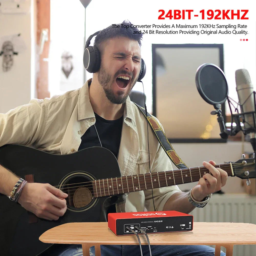 Red uc22 audio interface with black ports and white labeling featuring 192khz ad converter for live recording professional use