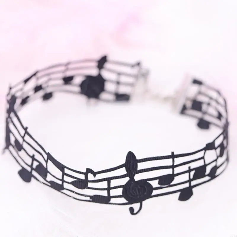 Black short necklace with intricate musical notes and treble clef design in alloy theme neck jewelry for music enthusiasts