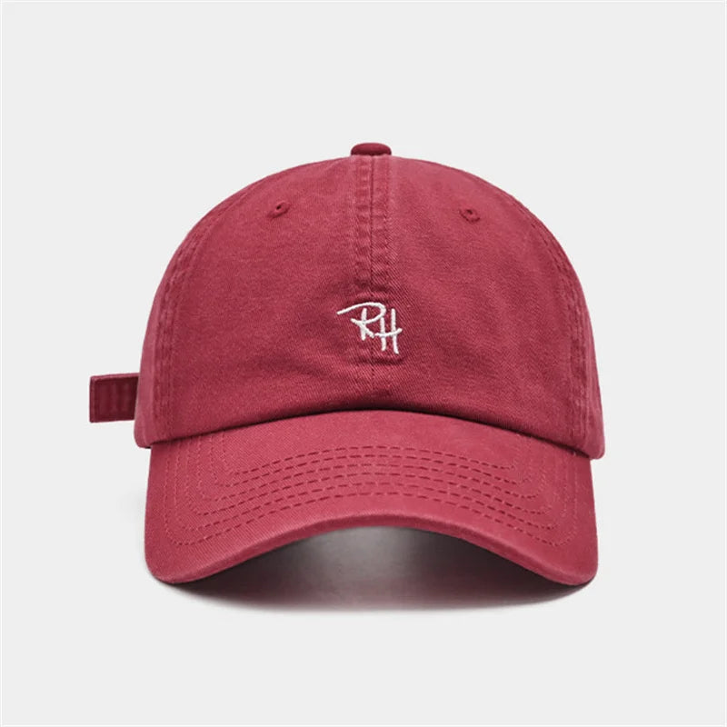 A maroon cotton unisex rh letter embroidery baseball cap designed as a summer casual hat with outdoor shade adjustable fit