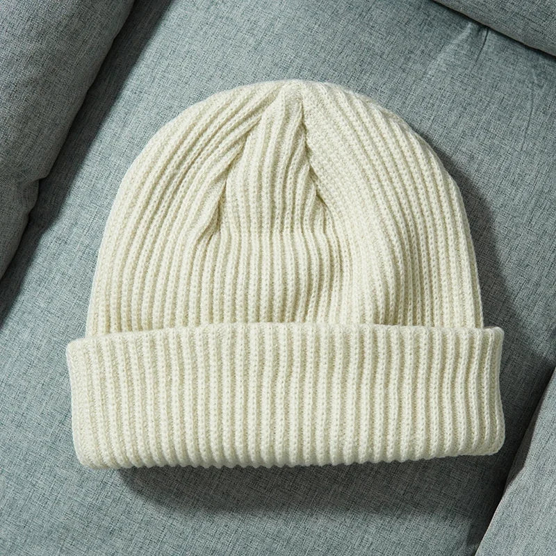 Cream-colored warm knitted beanie with ribbed knit and folded cuff for female wool gorras and hip hop dad style